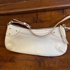 Mini White leather Coach purse.
